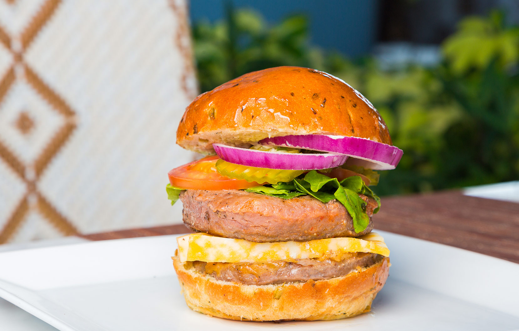Chef Maribel’s burger is not for the faint of appetite.