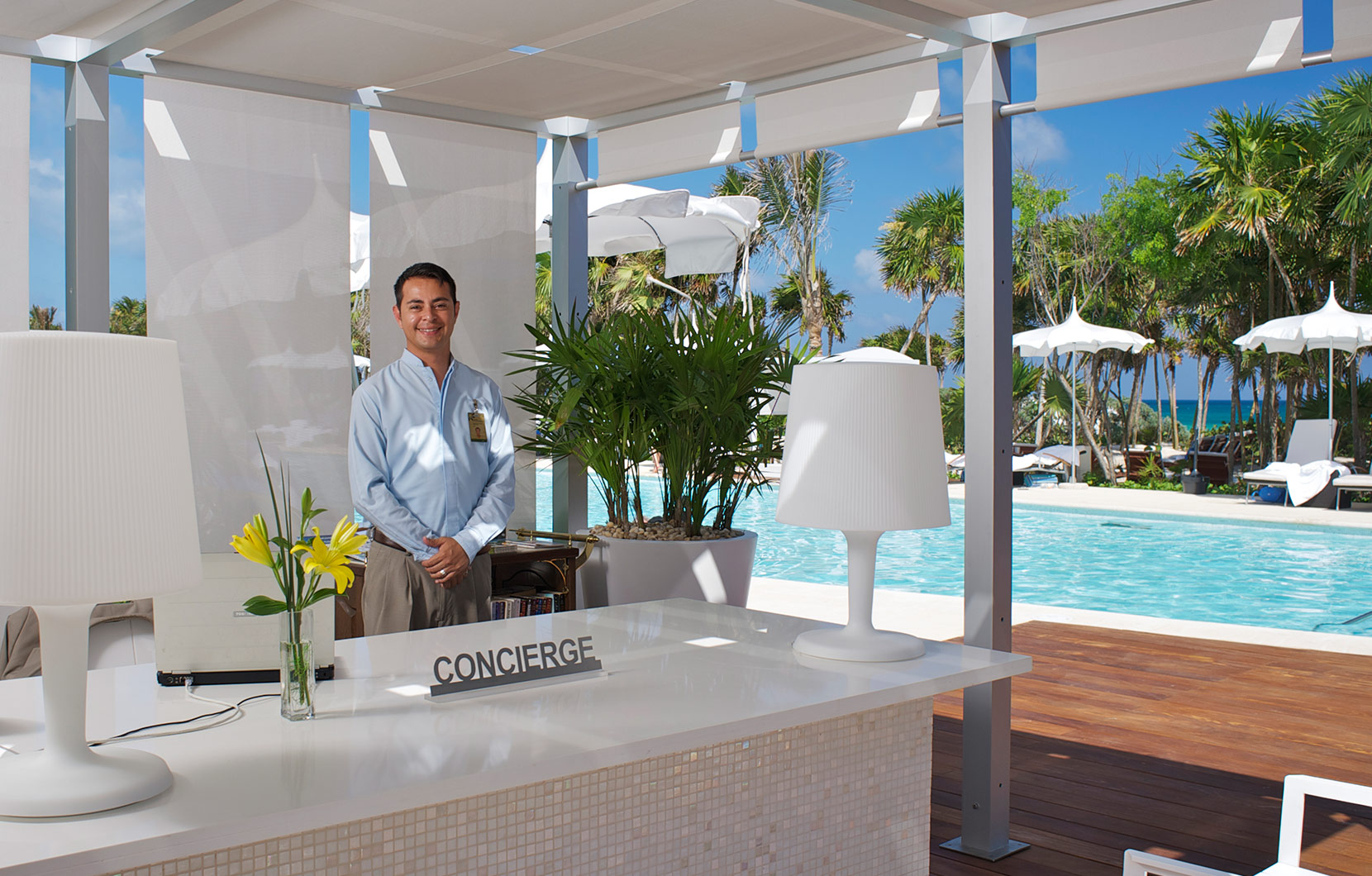 The Pool Concierge at the Grand Luxxe pool and sundeck.