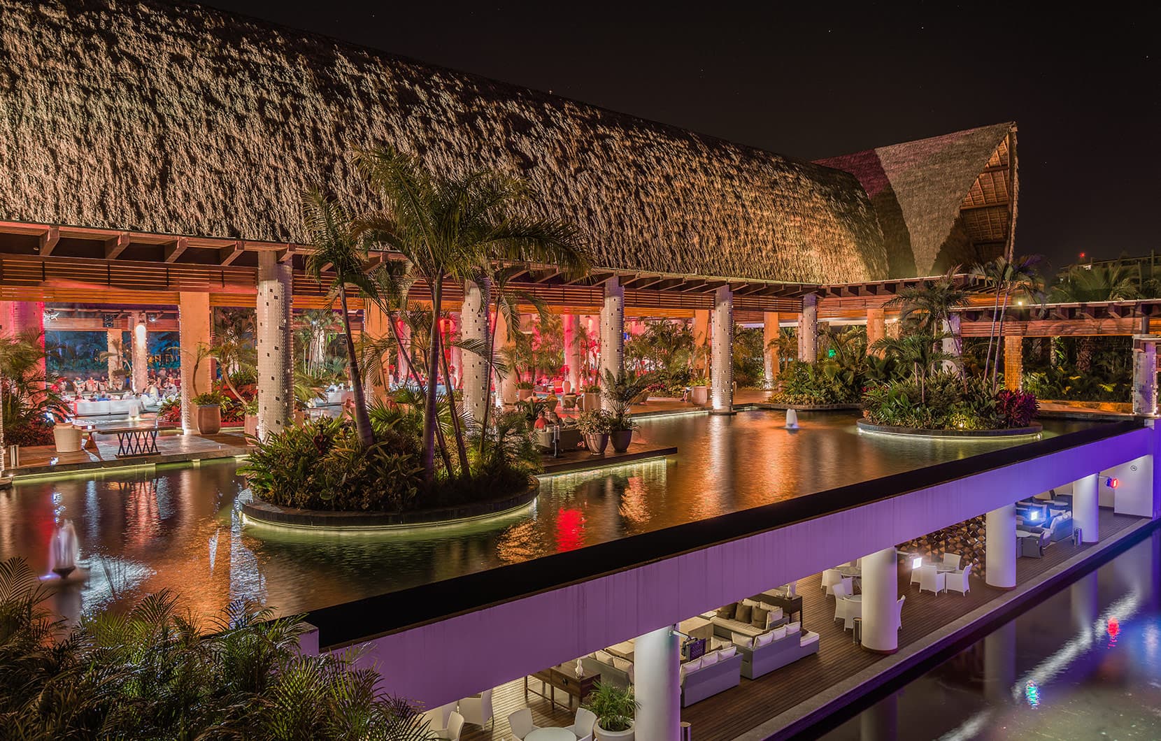 The grand palapa and sweeping decks of Santuario at Vidanta Nuevo Vallarta.