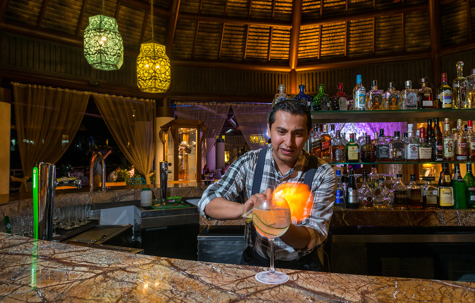A mixologist at Nektar, located at Vidanta Riviera Maya, creates one of the hotspot’s famous elixirs.
